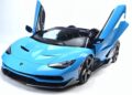 A blue Lamborghini Centenario Roadster with its scissor doors open, photographed against a white background. Only 10 in the U.S.: this stunning sports car is a rare masterpiece hitting the market.