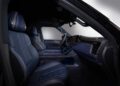 Interior view of the 2026 INFINITI QX80 SPORT Grade showcases dark blue leather seats, a center console, and a digital dashboard, highlighting how the new model ups the luxury game.