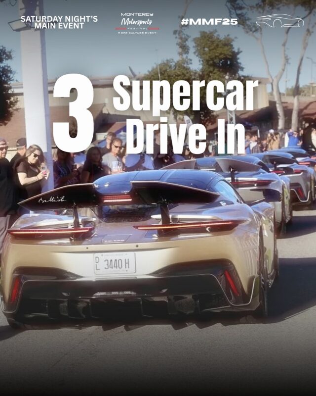 Three gold supercars drive into an event, watched by a crowd of people standing on both sides of the street.