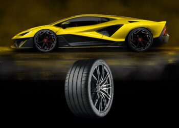 A yellow sports car is shown in profile above a close-up of a black high-performance tire, highlighting Bridgestone—named sole tire partner for the limited-run Lamborghini Fenomeno—against a dramatic dark background.