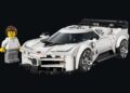 A white LEGO sports car with black accents, inspired by the iconic Bugatti Centodieci, is shown next to a LEGO minifigure in a white outfit, both displayed against a black background. LEGO and Bugatti unite to celebrate this masterpiece.