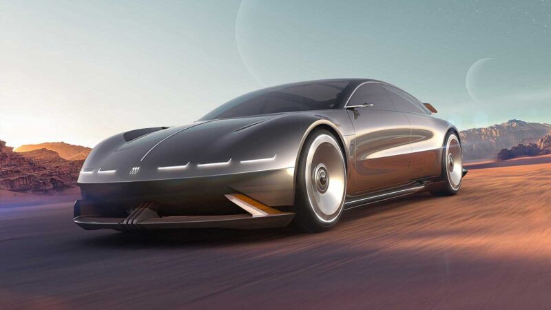 A sleek, futuristic black Buick Electra Orbit Concept car drives on a paved road through a desert landscape, where mountains and distant planets evoke the spirit of '50s Jet Age meeting modern minimalism.