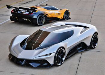 Two futuristic sports cars, inspired by the Corvette CX & CX.R Vision Gran Turismo signal the future of America’s sports car, stand parked—one silver and one yellow with black accents—on a concrete surface under clear daylight.
