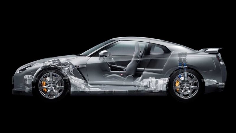 Side view of a silver Nissan R35 GT-R sports car, with a semi-transparent overlay revealing its next generation internal mechanical components and seating arrangement.