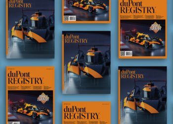 Multiple issues of duPont REGISTRY magazine are shown, including the September 2025 edition, featuring a close-up of a black and orange sports car on the cover against an orange background.