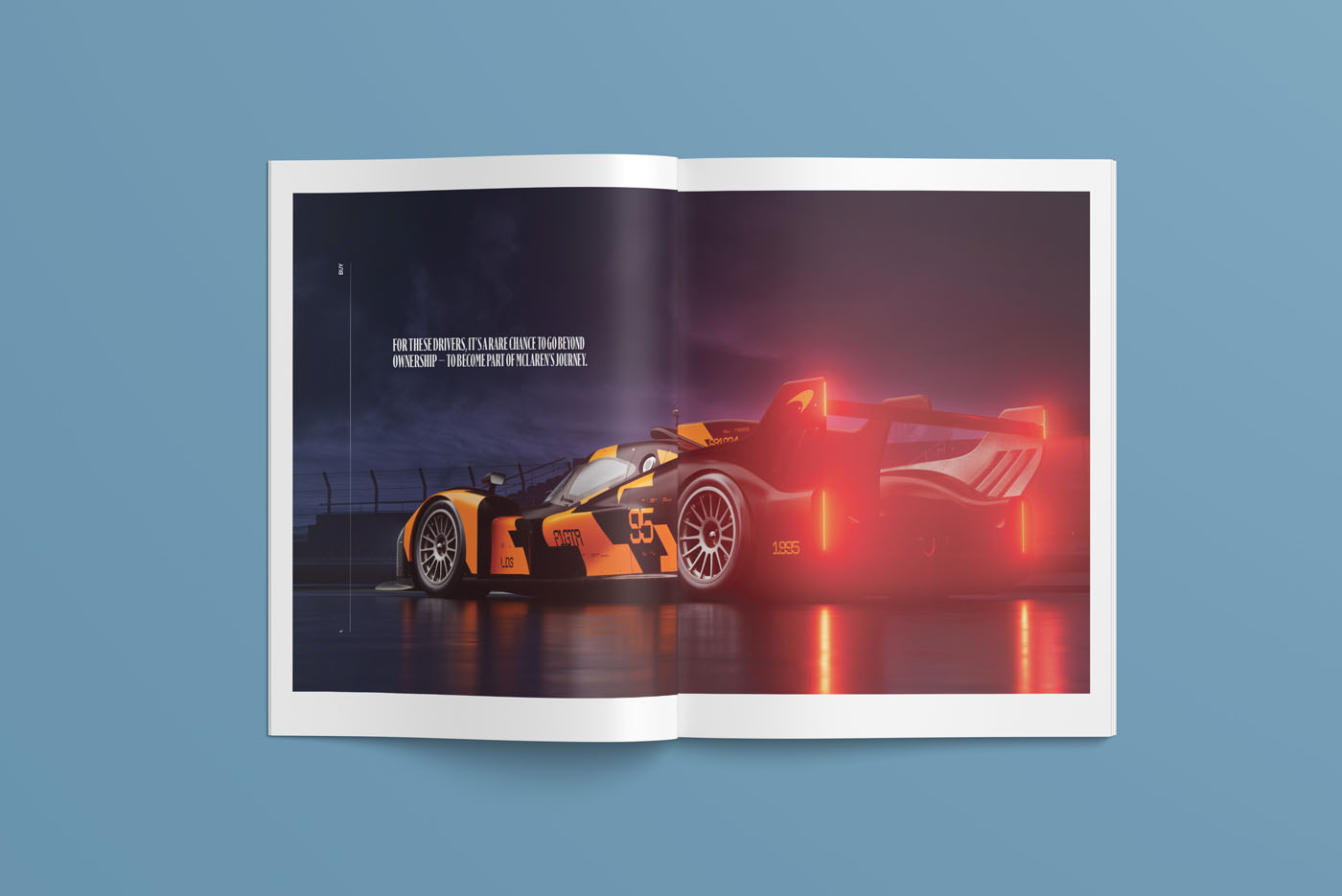 A duPont REGISTRY magazine spread features a sleek, orange and black race car with illuminated rear lights on a wet racetrack at night, viewed from behind—an unforgettable scene from September 2025.