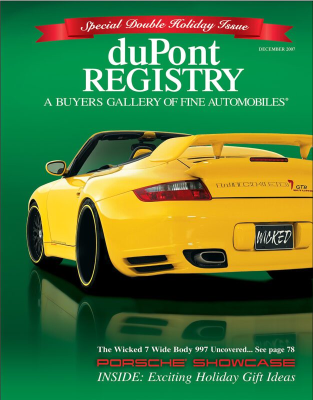 A yellow Porsche 997 sports car with a rear spoiler graces the Cover Cars segment on duPont REGISTRY’s December 2007 issue, celebrating holiday gift ideas and its 40th Anniversary with exclusive automobile showcases.