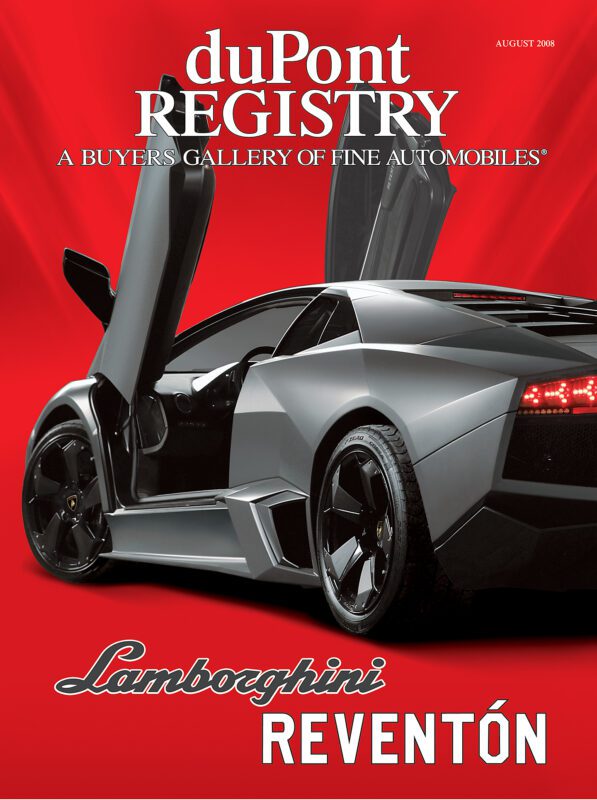 A matte gray Lamborghini Reventón with scissor doors open is featured as one of the iconic Cover Cars on the August 2008 duPont REGISTRY magazine, set against a solid red background.