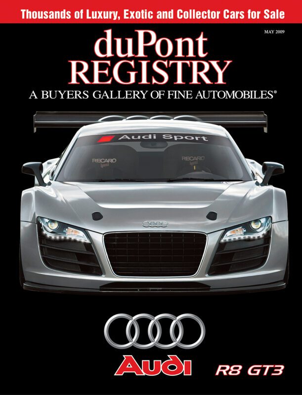 Front cover of duPont REGISTRY's 40th Anniversary edition featuring a silver Audi R8 GT3 race car under the headline "A Buyers Gallery of Fine Automobiles," with Audi logos and branding among the exclusive Cover Cars.