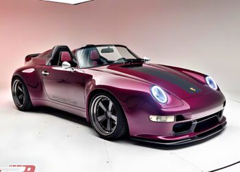 A purple Gunther Werks Speedster convertible with black accents is displayed in a studio with white walls and a seamless floor, showcasing the signature style of Graham Rahal Performance.