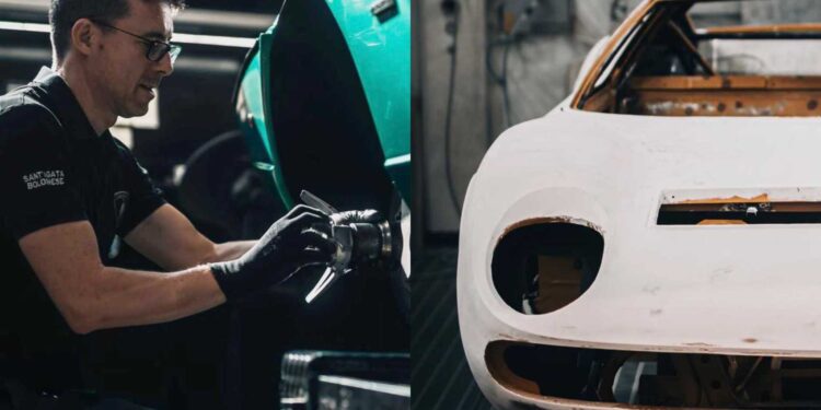 A man works on the rear of a green Lamborghini while another car with a white, unfinished body is in the background of an automotive workshop at Polo Storico.
