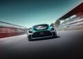 A limited edition Mercedes-AMG GT2 race car drives at high speed on a racetrack, photographed from a low front angle with blurred motion in the background.