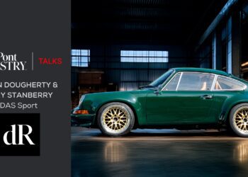 A green classic sports car with gold wheels is parked indoors; event details for a duPont Registry talk on Porsche Restoration with Colin Dougherty and Gary Stanberry of DAS Sport are shown on the left.