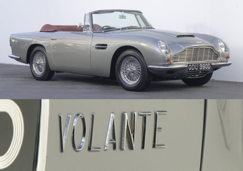 A classic silver convertible with a red interior is parked, featuring a detail image of the "VOLANTE" badge—celebrating Q by Aston Martin Marks 60 Years of Volante With Ultra-Exclusive Anniversary Editions.