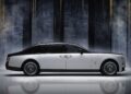 A luxury black and white sedan is shown in a side profile view against a dark, patterned background with vertical light streaks, celebrating Rolls-Royce Honors 100 Years Of Phantom With Groundbreaking Private Collection.