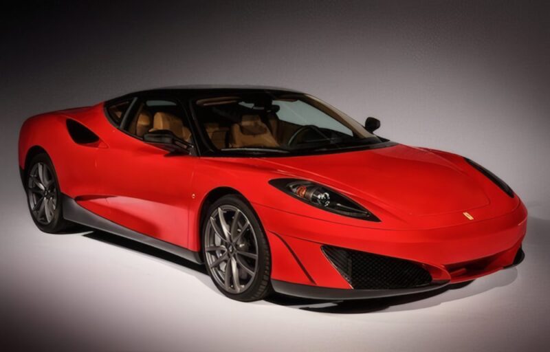 A red sports car with a sleek design, black roof, and tan interior—one of the 1-of-1: Rarest Ferraris In The World—is parked on a plain, neutral background.
