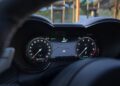 Close-up of the updated 2026 Alfa Romeo Tonale’s digital dashboard, displaying speedometer, tachometer, fuel gauge, and navigation screen, with the vehicle at rest.