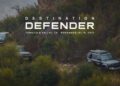 Three Land Rover Defenders navigate a rugged, bushy trail with text overlay: Destination Defender West, Nov. 14-16, Temecula Valley, California, 2025.