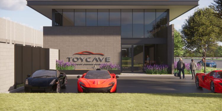 Modern building with large windows labeled "TOYCAVE," three sports cars parked in front, and several people walking toward the entrance on a sunny day.