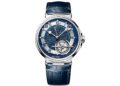 A luxury wristwatch with a blue patterned dial, roman numerals, a visible tourbillon mechanism, and a blue leather strap—perfect for those seeking the best luxury watches.