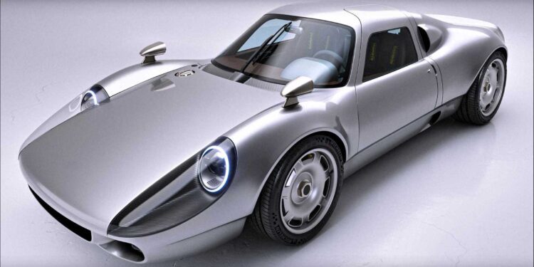 A silver Aerfal Automotive sports car with a sleek, aerodynamic design is parked on a white surface, viewed from the front left angle—a modern take that goes Beyond 911 with subtle 904 restomod influences.