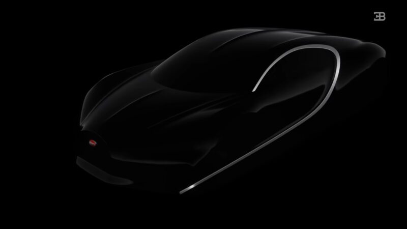 A sleek black car is mostly in shadow, with thin white accent lines outlining its contours and a small illuminated Bugatti logo on the front—capturing how form and function from past and future came together in the Bugatti Tourbillon.