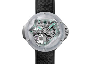 A modern wristwatch inspired by the Hublot MP-17, featuring a transparent, asymmetrical face revealing internal gears, a black textured strap, and mint green accents on the dial and hour markers—a striking limited edition piece.
