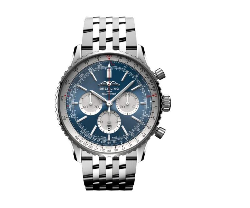 A stainless steel Breitling Navitimer chronograph, considered among the best luxury watches, features a blue dial, three subdials, date window, and a sophisticated metal link bracelet.