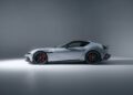 A silver Ferrari 12Cilindri with NOVITEC customizations is shown in profile view against a plain, softly lit background.