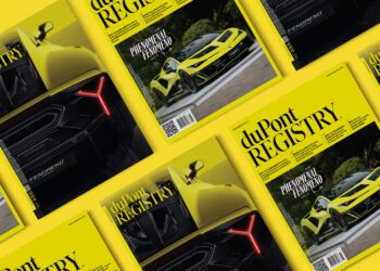 Multiple copies of the October 2025 duPont REGISTRY magazine with a yellow Lamborghini on the cover and the headline “PHENOMENAL FENOMENON,” arranged against a striking yellow background.