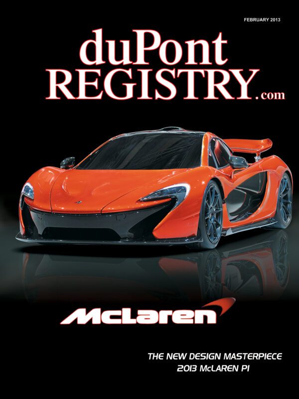 Front cover of duPont REGISTRY magazine features an orange 2013 McLaren P1 sports car with the headline "The New Design Masterpiece," celebrating Cover Cars for the brand’s 40th Anniversary.
