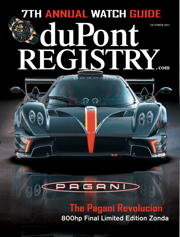 Front view of a black Pagani Revolucion with red accents on the duPont REGISTRY Cover Cars magazine, October 2013 issue, featuring the headline "The Pagani Revolucion" and celebrating duPont REGISTRY's 40th Anniversary.