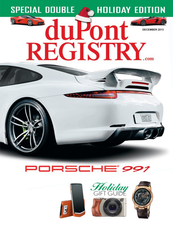 Cover Cars: duPont REGISTRY magazine, December 2013—40th Anniversary edition featuring the rear view of a white Porsche 991, surrounded by holiday gift items and festive banners.