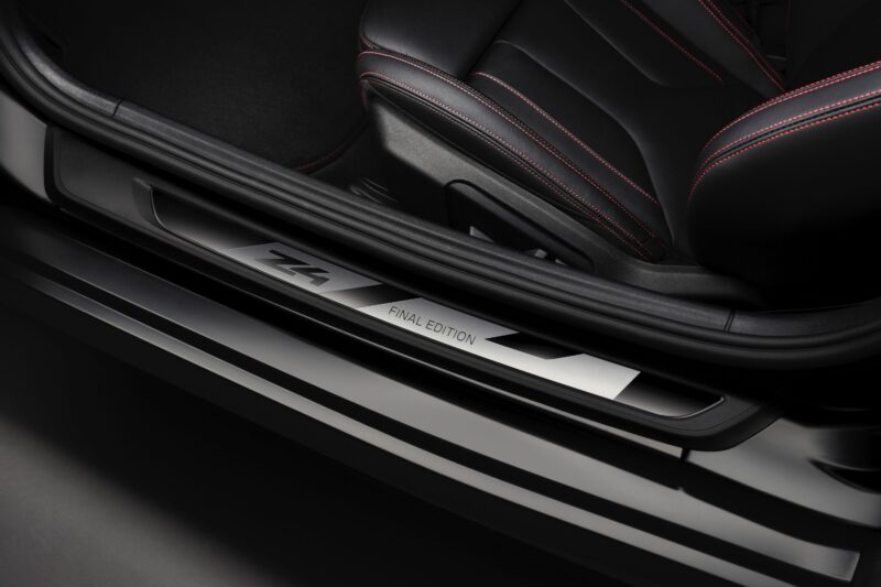 Close-up of a car door sill plate labeled "Z4 FINAL EDITION," highlighting the End of the Road: 2026 BMW Z4 Final Edition Breaks Cover, positioned beside a black leather seat with red stitching.