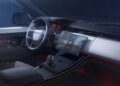 Modern car interior inspired by the Range Rover Expands 2026 Sport Lineup with SV Black SV Carbon and SV Bespoke Editions, featuring a digital instrument cluster, large central touchscreen display, and minimalist dashboard design.