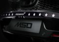 Close-up of a McLaren car's rear with the McLaren logo, star decals, and "MSO" text on the license plate area—Project Viva Revealed: One-of-One McLaren 750S Spider Brings Las Vegas to Life.