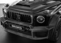 Close-up of the front view of a black Brabus-modified Mercedes-Benz G-Class, showcasing the grille, headlights, and carbon fiber body detailing—echoing the bold design seen as Brabus debuts 800 Cabrio and XL 800 Cabrio models.