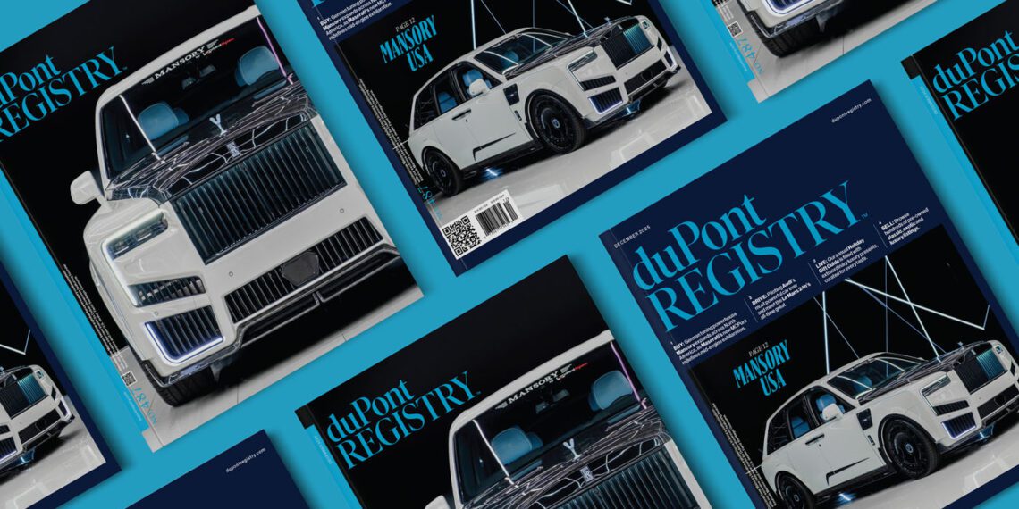 Multiple copies of the December 2025 duPont REGISTRY magazine are arranged on a blue surface, featuring a white luxury SUV on the cover.