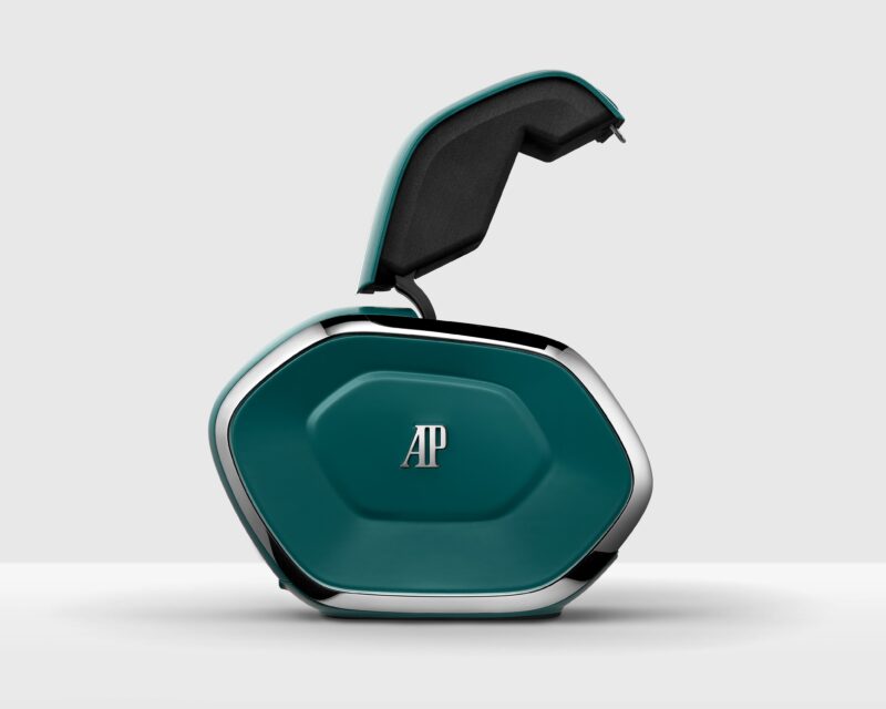 A teal and silver AI Setting Box with "AP" on the front is shown open, revealing a padded interior—perfect for safeguarding Audemars Piguet Royal Oak Perpetual Calendars—against a plain light background.