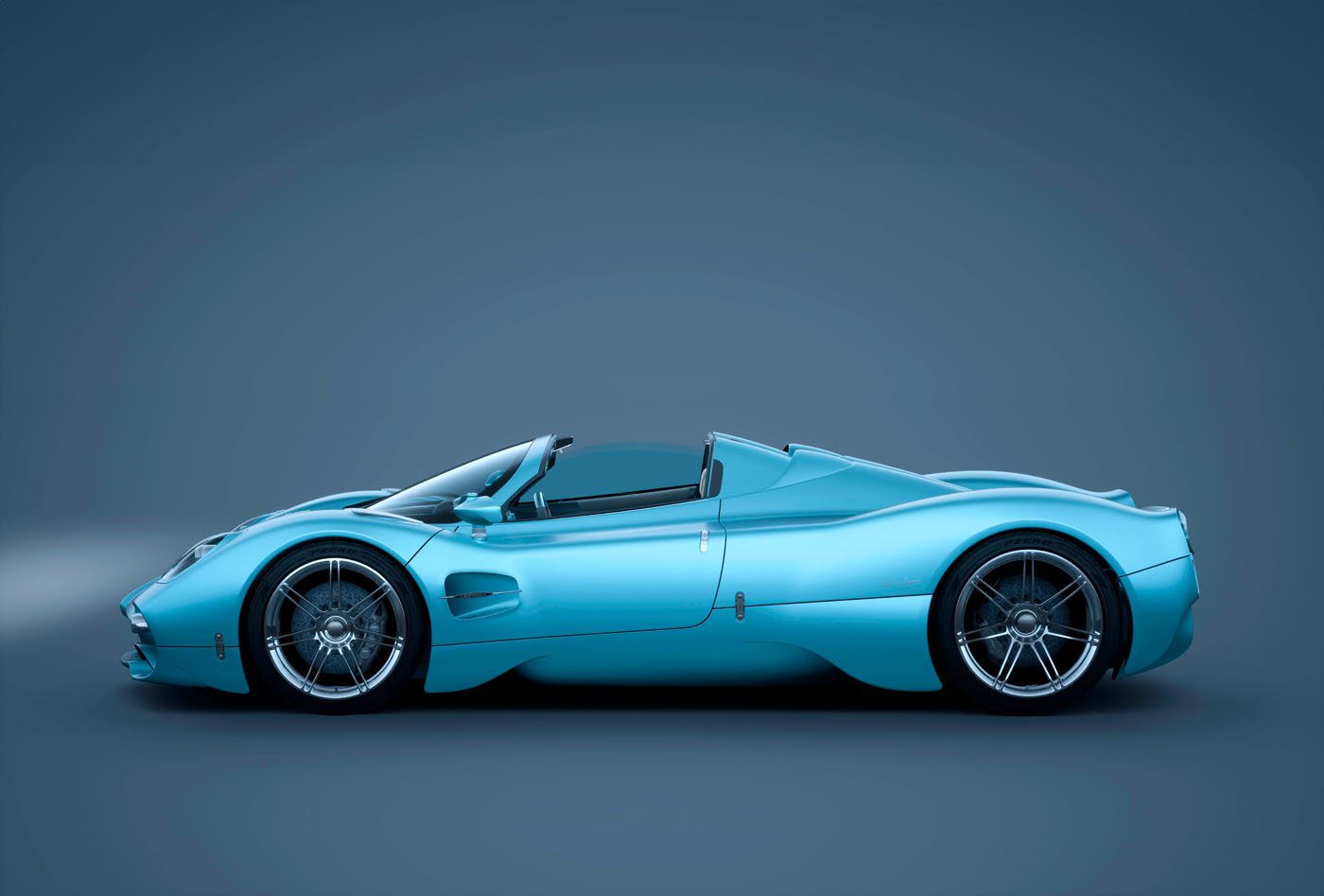 A sleek blue Utopia Roadster convertible sports car is shown from the side against a plain gradient background, evoking the luxury and exclusivity of Pagani Residences and their ultra-rare penthouses.