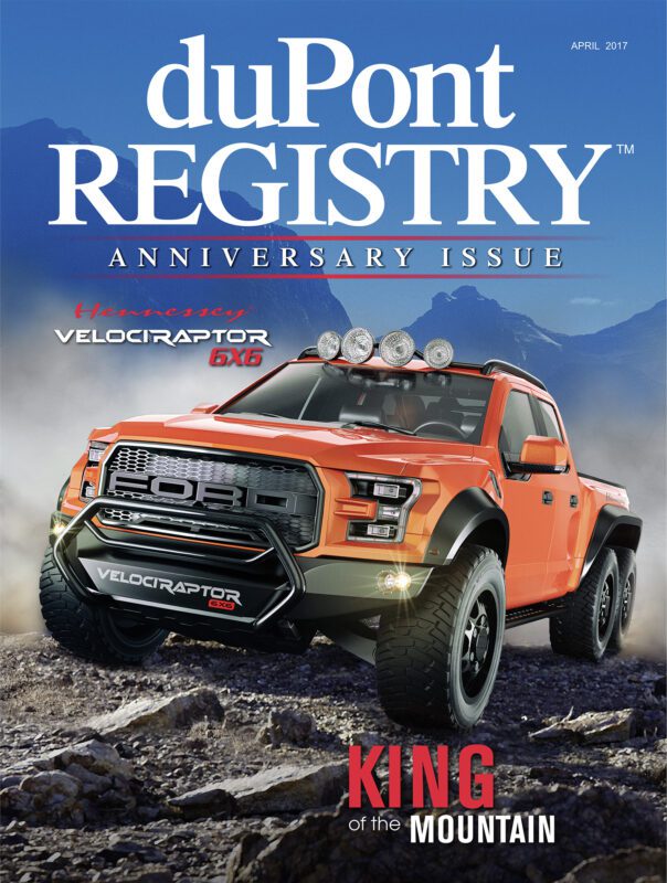 DuPont REGISTRY's 40th Anniversary cover features an orange Hennessey VelociRaptor 6x6 conquering rocky terrain with mountains behind. Text reads "KING of the MOUNTAIN," celebrating iconic Cover Cars through the decades.