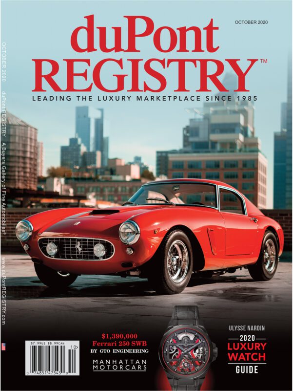 A red Ferrari 250 SWB is parked in front of a city skyline on the Cover Cars feature of duPont REGISTRY magazine’s October 2020 issue.