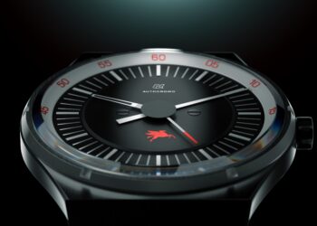 A close-up of the Autodromo Pegasus Watch, inspired by Group B rally racing, features a black face with red and white markers and a stylized red horse at the bottom center. The brand name "Autodromo" is visible near the top.