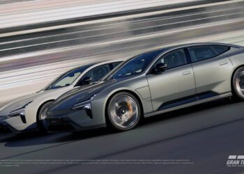 Two sleek, futuristic Polestar electric sedans race side by side on a track in Gran Turismo 7, capturing the thrill of virtual test drives with the game logo in the bottom right corner.