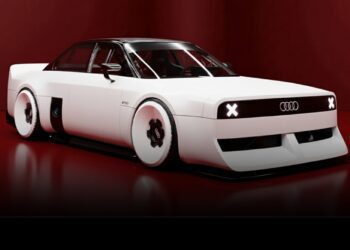 A futuristic white Audi concept car with a boxy design, black roof, and minimalist LED lights is displayed against a red background. This '80s Retro-inspired Audi Design Study is actually an RS3 underneath.