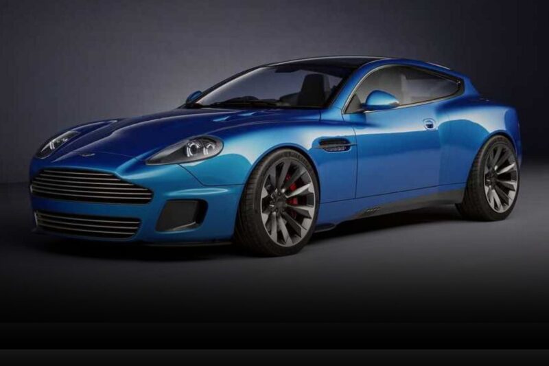 A blue two-door sports car is parked on a dark surface with a dark background, showcasing alloy wheels and a sleek, modern design reminiscent of the 20 Cars That Focused on Analog Engagement in 2025.