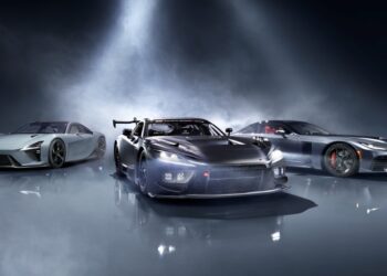 Three sleek, high-performance sports cars—including the striking Lexus LFA Concept—are showcased in a studio setting under dramatic lighting, with the central car flaunting a prominent rear wing and racing modifications.