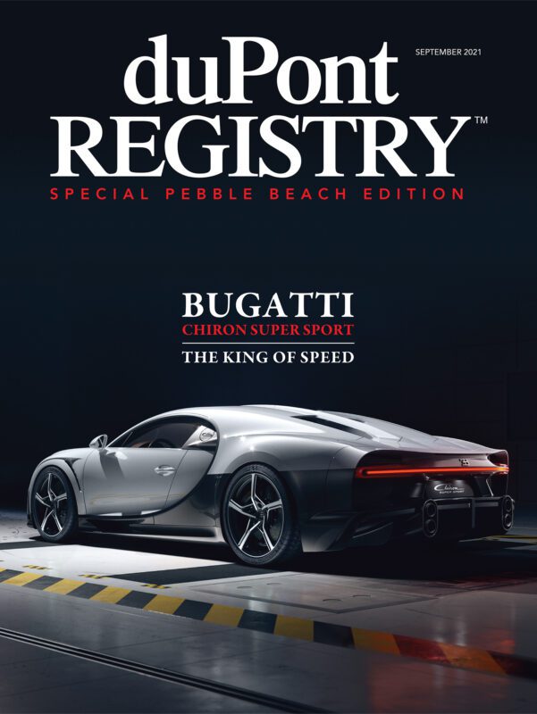 A silver Bugatti Chiron Super Sport graces the duPont REGISTRY Cover Cars for the special Pebble Beach edition, celebrating the 40th Anniversary under the spotlight.