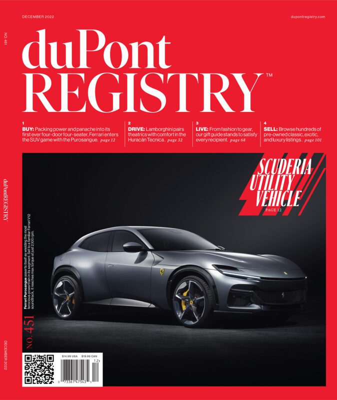 A grey Ferrari SUV graces the duPont REGISTRY cover for the December 2022 issue, celebrating 40th Anniversary Cover Cars, set against striking headlines and a bold red background.